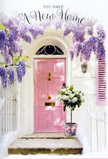 In this tender Earlsfield scene, a pastel doorway becomes a symbol of welcome and hope, wrapped in floral grace. The front door is painted a soothing pale pink, delicately chalked so that the fine brushstrokes and gentle variations in tone are subtly visible, making the entrance feel personal and lived-in from the very first day. Beside it, a single shutter in a lighter blush hue leans against a pristine white wall, completing a soft, calming palette that feels ideally suited to a quiet residential street off Garratt Lane. Above, cascades of lavender wisteria spill downwards, the blooms hanging in loose, fragrant sprays that frame the door like a floral curtain. Their clusters create shifting shadows across the wall and doorstep, giving the scene depth and a sense of gentle movement, as though the breeze from the nearby River Wandle is passing through. Resting on the stone step is a simple grey bucket generously filled with white and cream roses, their rounded heads forming a plush, cloud-like mound of petals. Threads of fresh greenery weave through the blooms, adding soft contrast and emphasising the natural, hand-crafted style that a local florist would bring. A satin ribbon in pale pink is wrapped around the bucket and tied in a neat bow, its trailing ends catching highlights of sunshine and linking the arrangement visually back to the painted door. Together, these elements create a scene that feels intimate and quietly joyful-a perfect visual companion to a new home card or a thoughtful delivery for friends who have just picked up their keys in SW18. It speaks of fresh starts, cosy evenings, and the reassuring pleasure of being greeted by flowers every time you come home.
